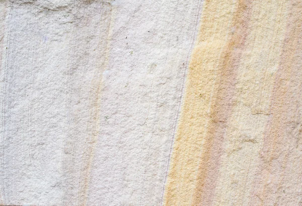 Mönstrad sandsten textur bakgrund (naturliga färg). — Stockfoto