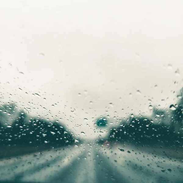 Driving Car In Rain On-Road Highway Stormy Windshield Traveling.