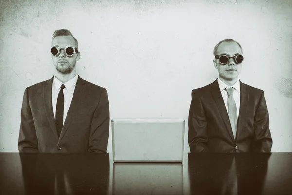 Two vintage businessman sitting at office desk — Stock Photo, Image