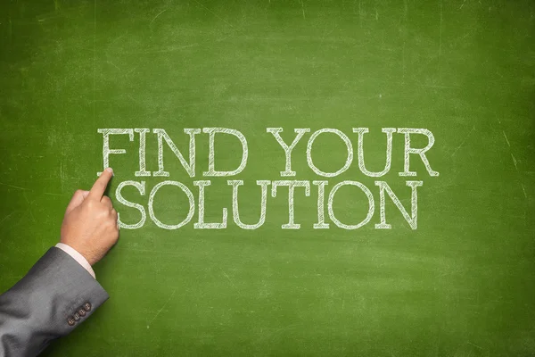 Find Your Solution text on blackboard with businessman hand pointing — Stock Photo, Image