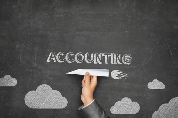 Accounting concept on blackboard with paper plane — Stock Photo, Image