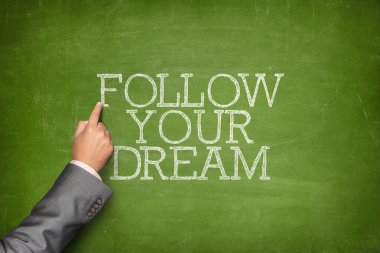 Your Dream metin blackboard iş adamı el işaret ile takip