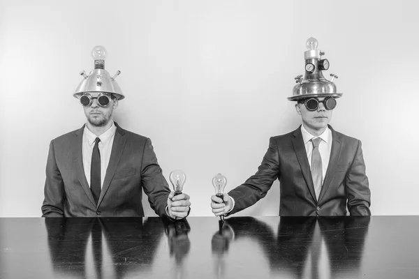 Two vintage businessman sitting at office desk — Stock Photo, Image