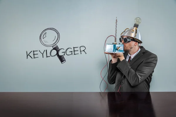 Texto Keylogger com empresário vintage — Fotografia de Stock