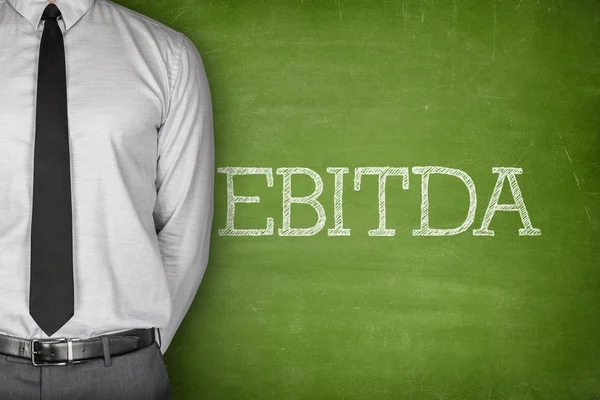 EBITDA tekst op blackboard — Stockfoto