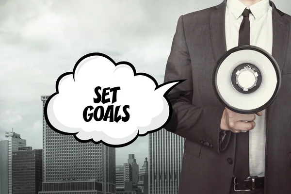 Set goals text on speech bubble with businessman — Stock Photo, Image