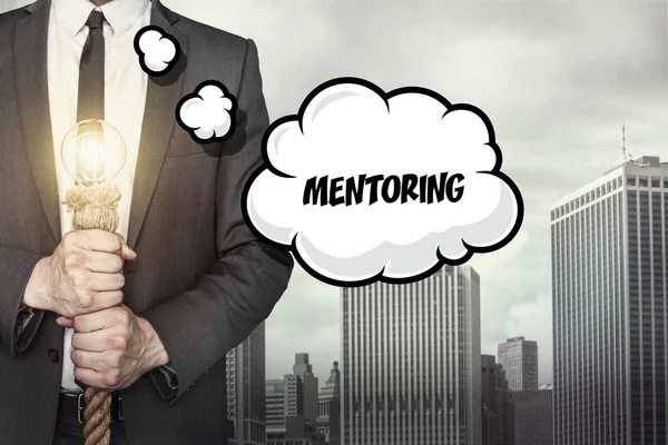 Mentoring tekst na dymek z biznesmenem — Zdjęcie stockowe