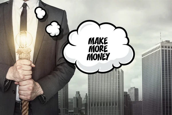 Meer geld tekst op de tekstballon met zakenman maken — Stockfoto