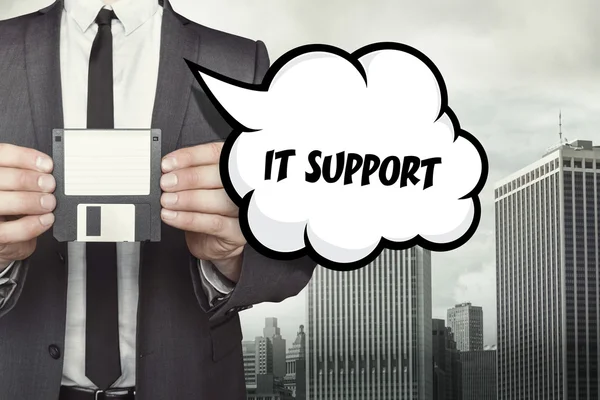 IT Support text on speech bubble with businessman — Stock Photo, Image