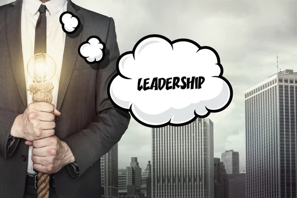 Leadership text on speech bubble with businessman — Stock Photo, Image