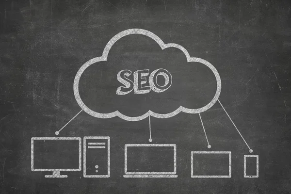 SEO concept op blackboard — Stockfoto