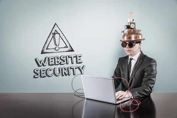 Website security text with vintage businessman using laptop — Stock Photo, Image