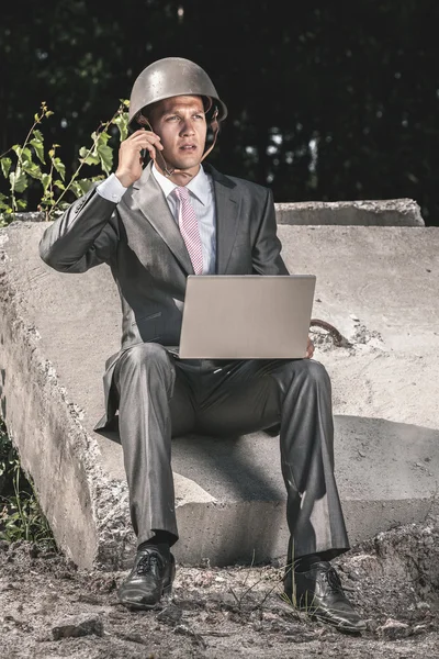 Businessman at war — Stock Photo, Image