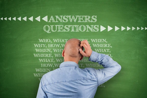 Answers questions on blackboard — Stock Photo, Image