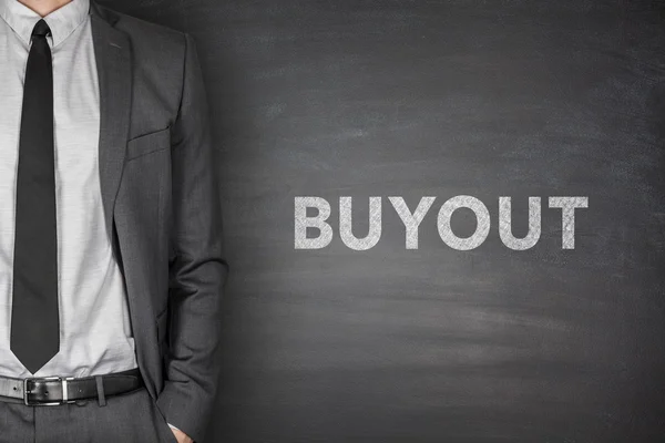 Buy-out op blackboard — Stockfoto