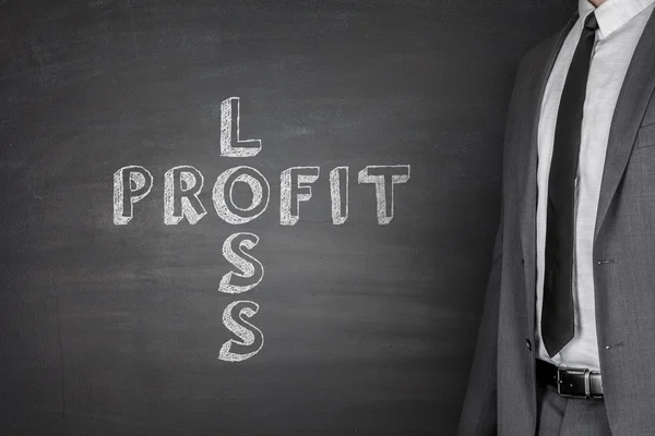 Loss & profit on blackboard — Stock Photo, Image