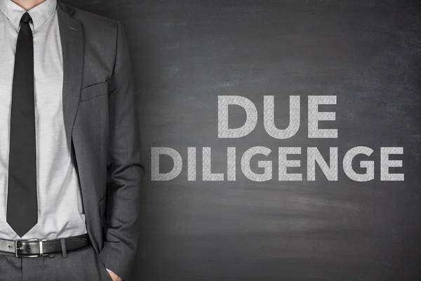 Due diligence on blackboard — Stock Photo, Image