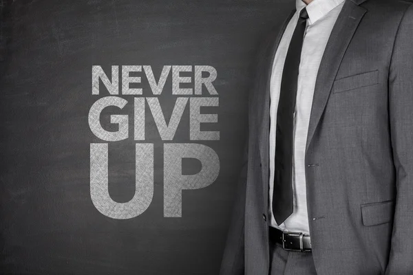 Never give up blackboard — Stock Photo, Image