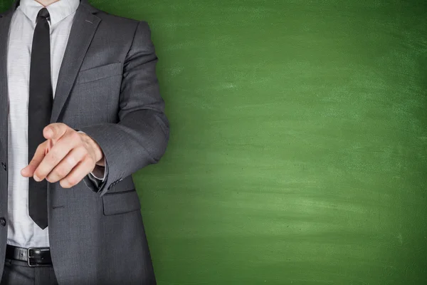 Businessman front of Blackboard — Stock Photo, Image