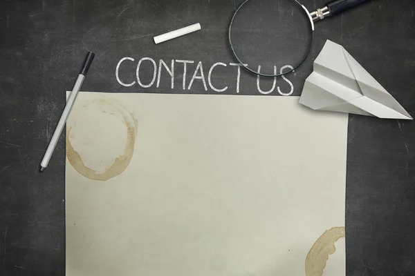 Contact us and blank application concept on black blackboard — Stock Photo, Image