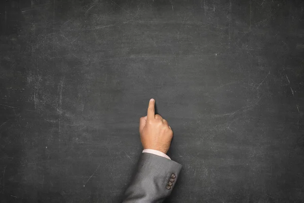 Leeg bord met zakenman hand wijzen — Stockfoto