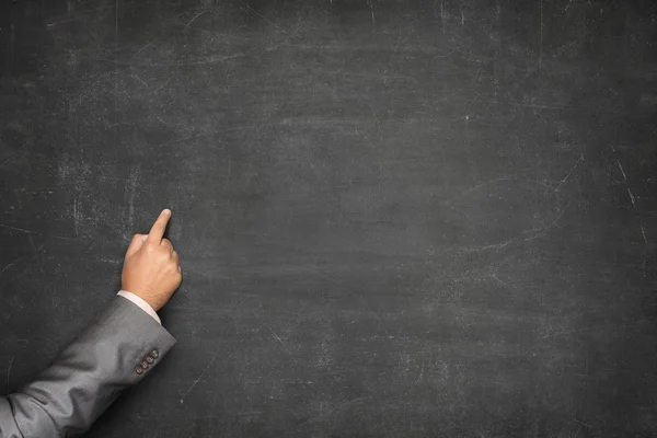 Leeg bord met zakenman hand wijzen — Stockfoto