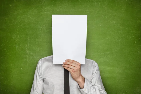Empty paper sheet front of businessman head — Stock Photo, Image