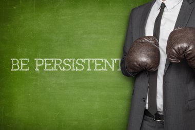 Be persistent on blackboard with businessman  clipart