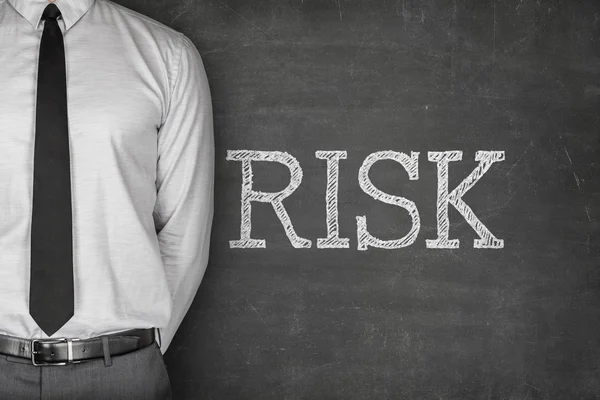 Risk concept on blackboard — Stock Photo, Image