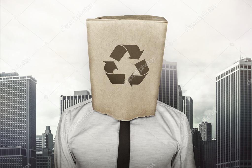 Recycling icon on paper bag what businessman is wearing on head