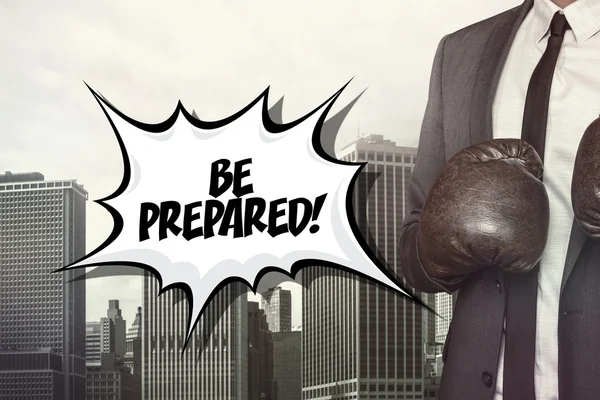 Be prepared text with businessman wearing boxing gloves — Stock Photo, Image