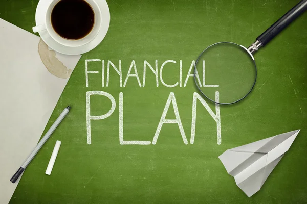 Financial plan concept on blackboard with empty paper sheet — Stock Photo, Image