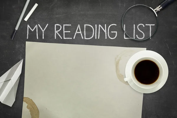 My reading list concept on black blackboard with empty paper sheet — Stock Photo, Image