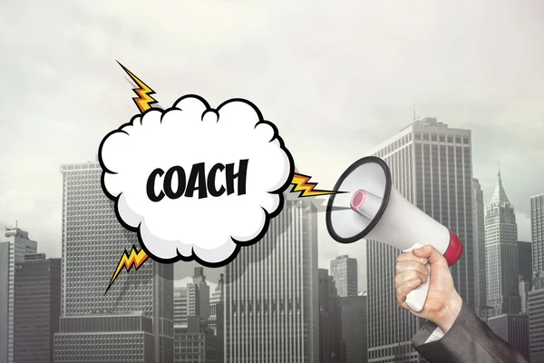 Coach text on speech bubble and businessman hand holding megaphone — Stock Photo, Image