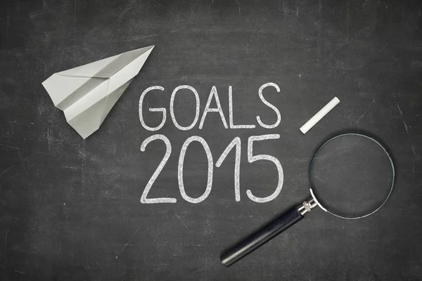 Goals 2015 concept on black blackboard with empty paper sheet — Stock Photo, Image