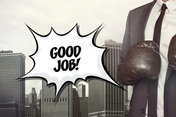 Good job text with businessman wearing boxing gloves — Stock Photo, Image