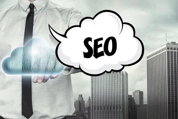 SEO tekst op cloud computing thema met zakenman — Stockfoto