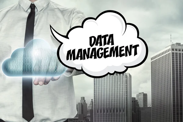 Data management text on cloud computing theme with businessman — Stock Photo, Image