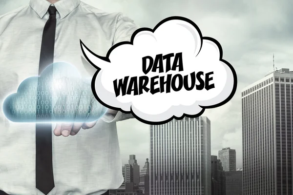 Data warehouse text on cloud computing theme with businessman — Stock Photo, Image