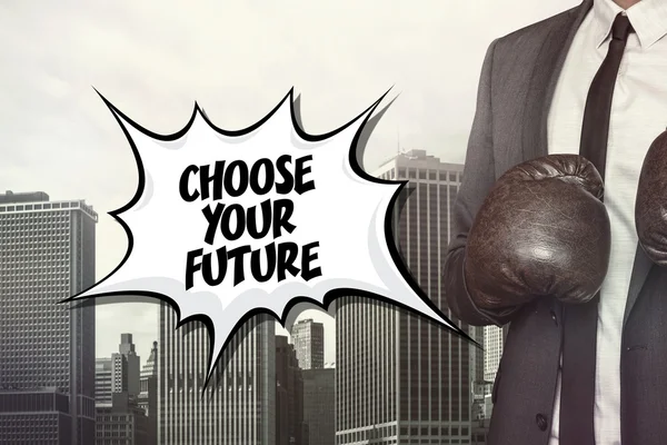 Choose your future text with businessman wearing boxing gloves — Stock Photo, Image