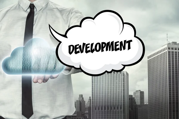 Development text on cloud computing theme with businessman — Stock Photo, Image