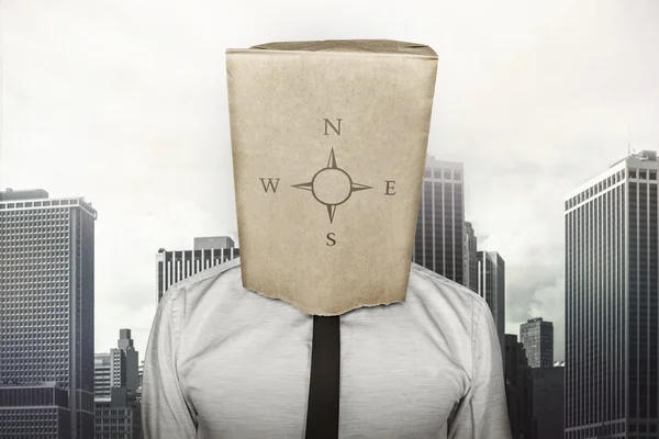 Podnikatel na sobě hnědý papírový sáček na hlavu — Stock fotografie