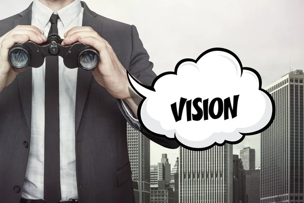 Vision text on speech bubble with businessman holding binoculars — Stock Photo, Image