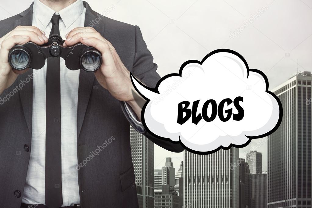 Blogs text on speech bubble with businessman holding binoculars