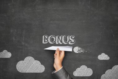 Kağıt Uçak ile yazı tahtası üzerinde bonus kavramı