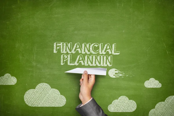 Financial planning concept on blackboard with paper plane — Stock Photo, Image