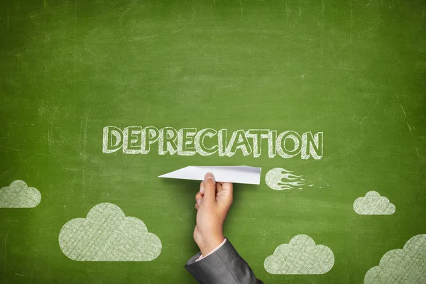 Depreciation concept on blackboard with paper plane — Stock Photo, Image