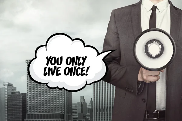 You only live once text on speech bubble with businessman and megaphone — Stock Photo, Image