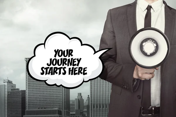 Your journey starts here text on speech bubble with businessman and megaphone — Stock Photo, Image