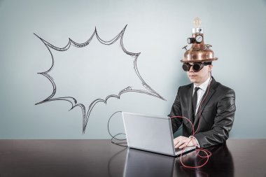 Konuşma kabarcık kavramı vintage işadamı ve dizüstü bilgisayar ile